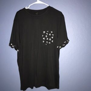 Palm tree print on a black shirt sleeve